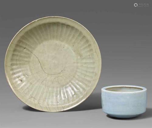 A Swatow dish and a small censer (koro). 16th-19th centurya) Covered with a celadon [...]