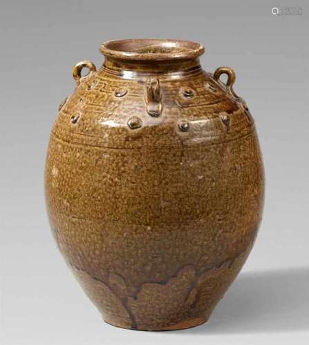 A large stoneware storage jar. 17th centuryWith an ovoid body with a short narrow [...]