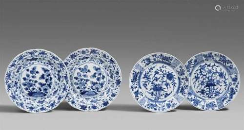 Four blue and white dishes. Kangxi period (1662-1722)Decorated with a) and b) [...]