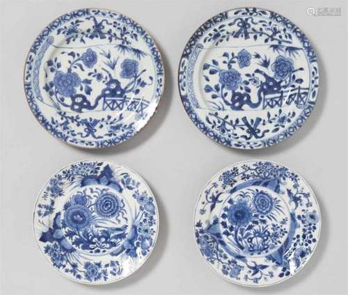 Four blue and white dishes. Kangxi period (1662-1722)Decorated with a) a bird, peonies and