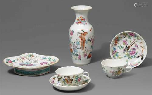 A group of six famille rose porcelains. 19th centurya) A vase with figure scenes. b) [...]