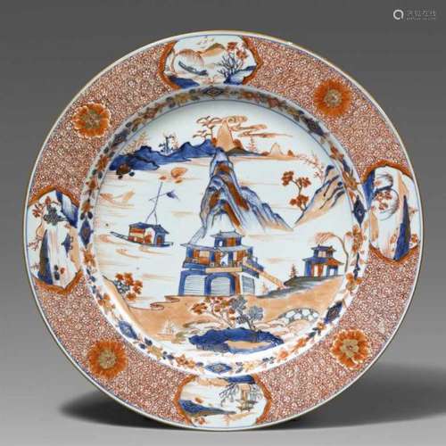 A Chinese Imari plate. Kangxi period (1662-1722)A large dish, decorated in [...]