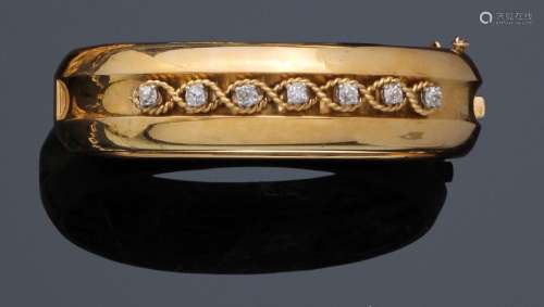 Large bracelet jonc en or jaune 750°/00 centré d'u…
