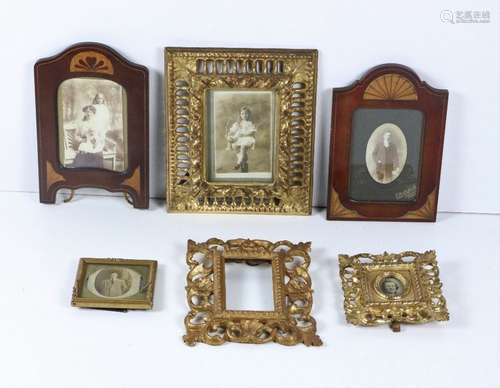 A collection of various Picture Frames, including …