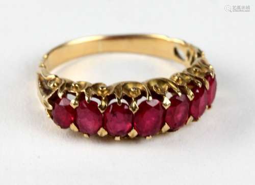 An attractive gold Ladies Ring, inset with seven r…