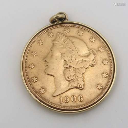 A gold Twenty Dollar American Eagle Coin, 1906. (1…