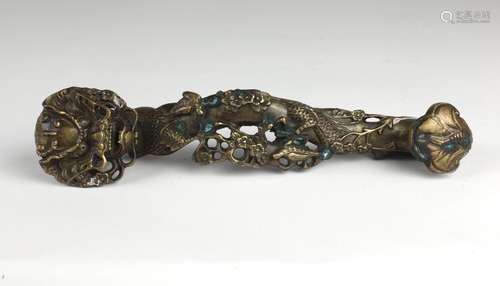 A rare Chinese bronze Ruyi Sceptre, in the form of…