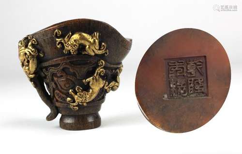 A fine Chinese carved horn Libation Cup, with craw…