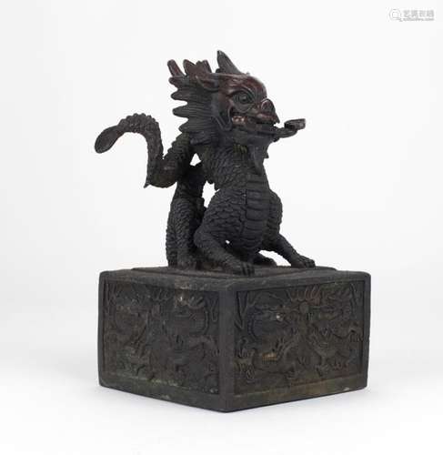 A large Chinese bronze Desk Seal, surmounted with …