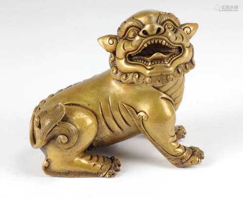 A very attractive Chinese gilt bronze Fo Lion, sea…