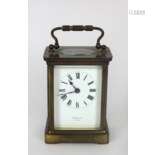 A small brass cased Carriage Clock, the white enam…