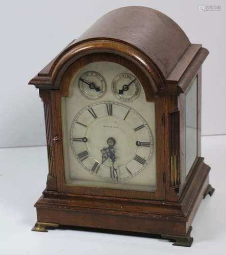 An attractive dome shaped oak framed Bracket Clock…