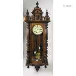 A good quality carved walnut Vienna Wall Wagger, w…