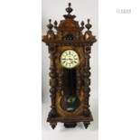 An impressive carved walnut Vienna Wall Clock, of …