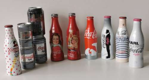 Ensemble de bouteilles collector de COCA-COLA : 4 cannettes en aluminium Jean-Paul [...]