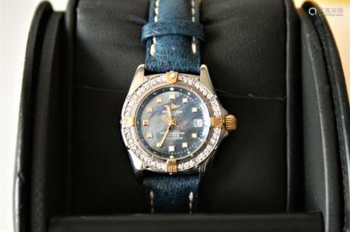 Montre femme BREITLING en acier et or, modèle Callistino (B72345) dotée d''une [...]