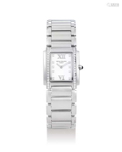 Patek Philippe. A Lady's Stainless Steel and Diamond-Set Bracelet Watch