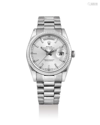 Rolex. A White Gold Bracelet Watch with Day and Date