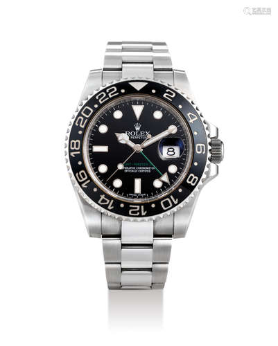 Rolex. A Stainless Steel Bracelet Watch with Dual Time Zone, Date and CERAMIC BEZEL