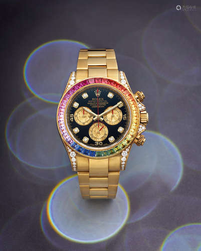 Rolex. A Fine Yellow Gold Diamond and Rainbow Sapphire-Set Chronograph Wristwatch with Bracelet