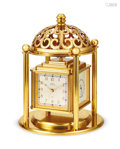 Angelus. A Gilt Four-Dialed Nautical Compendium including a timepiece display, hygrometer, Barometer and thermometer scales, Retailed by Tiffany and Co.