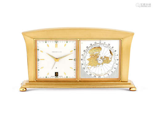 Angelus. A Fine Gilt Metal 8-Days Presentation World Time Desk Clock with date and alarm, Retailed by Tiffany & Co.