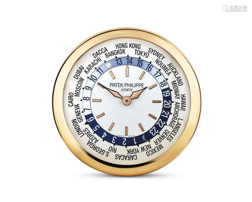 Patek Philippe. A Rare Large and Heavy Polished Brass and Stainless steel World Time Wall Clock