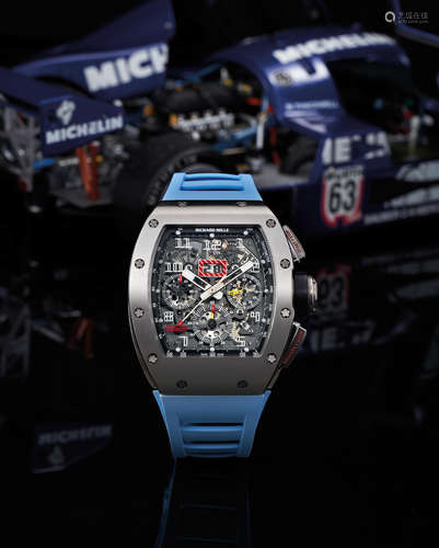 Richard Mille. A Fine White Gold and Titanium Semi Skeletonized Annual Calendar Flyback Chronograph Wristwatch with 60-Minute Countdown