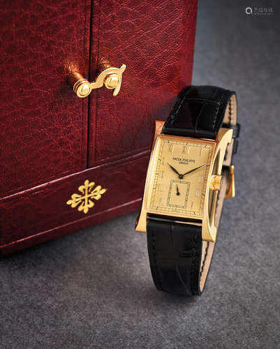 Patek Philippe. A Limited Edition Yellow Gold Wristwatch with Very Collectible Accompanied Paperwork