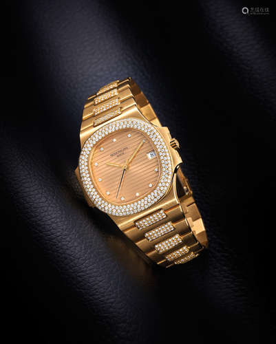 Patek Philippe. A Fine and Rare Yellow Gold and Diamond-Set Bracelet Watch with Date