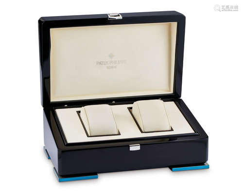 Patek Philippe. A Wooden Presentation Box For Two Watches