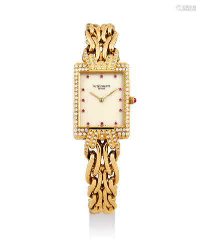 Patek Philippe. A Fine Lady's Yellow Gold, Diamond and Ruby-Set Bracelet Watch