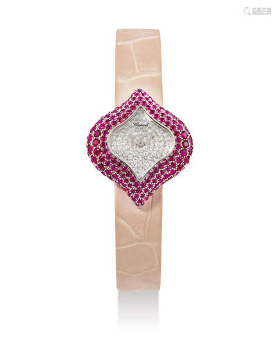 Chopard. A Lady's White Gold and Diamond-Ruby-Set Wristwatch