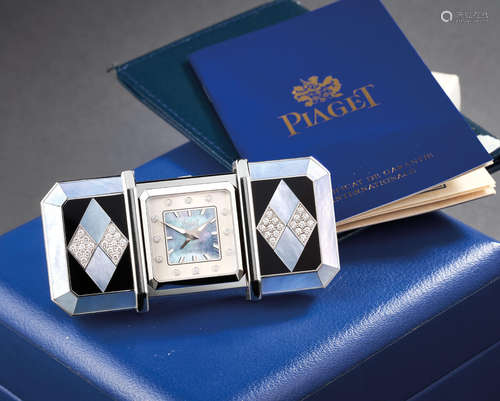 Piaget. A Unique White Gold, Diamond-Set and Mother-of-Pearl Travel Timepiece with Alarm