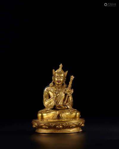 Tibet, 16th/17th century A gilt copper-alloy figure of Padmasambhava