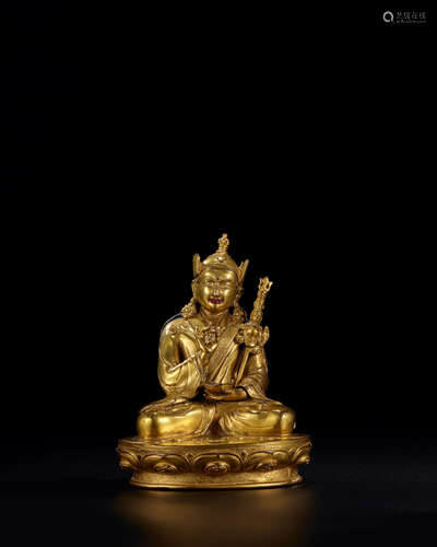 Tibet, 16th/17th century A gilt copper-alloy figure of Padmasambhava