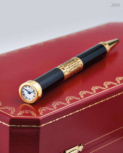 Cartier. A Limited Edition Gilt Calendar Pen Watch