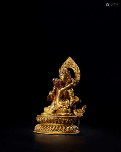 Nepal, dated by inscription to 1825 and of the period A rare gilt-bronze group of Vajrasattva in union with Vajramamani