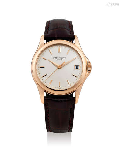 Patek Philippe. A Pink Gold Wristwatch with Date