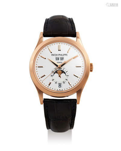 Patek Philippe. A Fine Pink Gold Annual Calendar Wristwatch with Moon Phases and Day/Night Indication