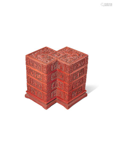 Qianlong A rare carved cinnabar-lacquer tiered double-lozenge shaped box and cover