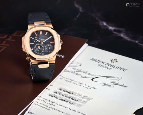 Patek Philippe. A Fine Pink Gold Wristwatch with Date, Power Reserve Indicator, and Moon Phases