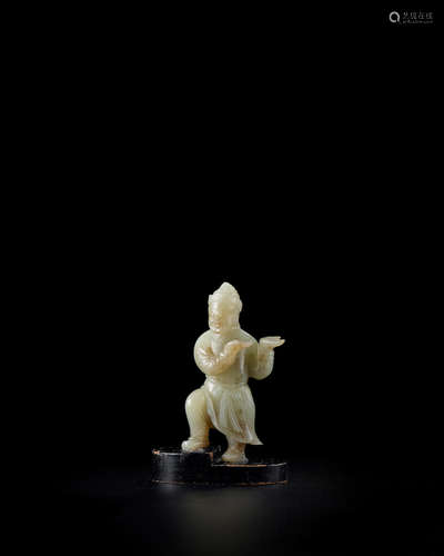 Yuan Dynasty A rare pale green jade carving of a foreigner