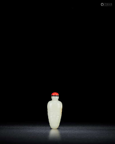 18th/19th century A white jade 'taotie' snuff bottle