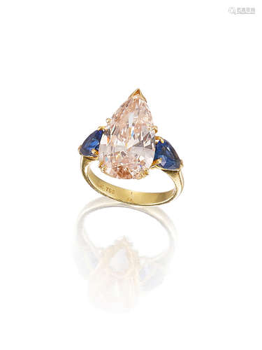 A Coloured Diamond and Sapphire Three-Stone Ring