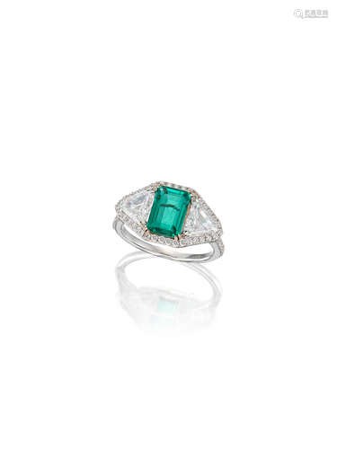 An Emerald and Diamond Ring