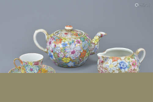 Chinese Three Piece Tea Service comprising Teapot, Milk Jug and Cup & Saucer with Million Flower Des