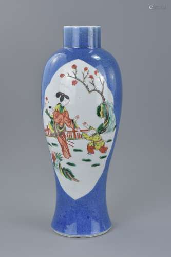 A Chinese 19th century powder blue famille rose porcelain vase decorated front and back with figures