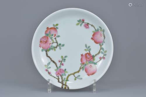 A Chinese famille rose porcelain dish finely painted with eight pomegranates. Six character seal mar