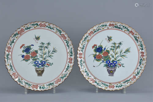 Pair of Japanese porcelain Plates with Fluted Edges decorated with a display of flowers and bamboo i